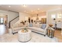 Beautifully decorated living room with hardwood floors and stylish furnishings at 402 Bumble Circle, Murrells Inlet, SC 29576