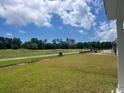 Lush green backyard overlooking golf course at 9738 Indigo Creek Blvd., Murrells Inlet, SC 29576