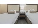 Comfortable bedroom featuring two plush beds with a shared nightstand at 1105 S Ocean Blvd. # 422, Myrtle Beach, SC 29577