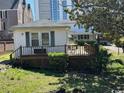 Cozy deck with wood railing and a charming yard at 1504 Chester St., Myrtle Beach, SC 29577