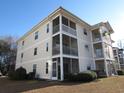 Charming condo building featuring screened porches and meticulous landscaping in a desirable community at 573 Blue River Ct. # 8-H, Myrtle Beach, SC 29579