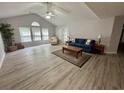Bright and airy living room with vaulted ceiling and ample natural light at 19 Pistachio Loop # G, Murrells Inlet, SC 29576