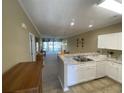Open floorplan with kitchen, dining, and living area at 901-9 West Port Dr. # 907, North Myrtle Beach, SC 29582