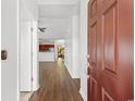 Inviting entryway with hardwood floors, and views into the kitchen and dining area, creating a warm and open feel at 120 Carolina Crossing Blvd., Little River, SC 29566