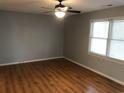 Bright bedroom with natural light, wood flooring, and neutral color palette at 4204 Peachtree Ln., Myrtle Beach, SC 29588