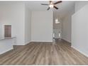 Spacious living room with vaulted ceilings showcasing the entrance and modern flooring at 625 Woodside Dr., Conway, SC 29526