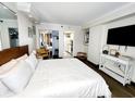 Bright bedroom featuring a comfy bed, TV, and stylish accents at 6900 N Ocean Blvd. # 1034, Myrtle Beach, SC 29579