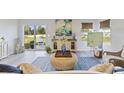 Bright living room with hardwood floors, natural light, and stylish furniture at 985 Cherrystone Loop, Conway, SC 29526
