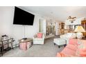 Comfortable living room featuring furnishings, with a TV for entertainment at 1310 N Waccamaw Dr. # 211, Garden City Beach, SC 29576