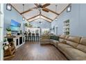 Spacious open-concept living room with vaulted ceilings, hardwood floors, and a cozy atmosphere at 1021 Myrtle Dr., Surfside Beach, SC 29575
