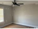 Bedroom with natural light, ceiling fan, and neutral paint at 8054 Mill Pond Rd., Galivants Ferry, SC 29544