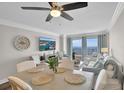 Inviting dining and living area featuring comfortable seating, coastal decor, and beautiful ocean views at 2001 S Ocean Blvd. # 406, Myrtle Beach, SC 29577