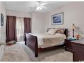 Cozy bedroom with soft carpet, a queen-sized bed, and natural light from the window at 2037 Silvercrest Dr. # 16E, Myrtle Beach, SC 29579