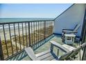 Cozy balcony featuring chairs, perfect for relaxing with stunning ocean views at 2101 S Ocean Blvd. S # B-6, North Myrtle Beach, SC 29582