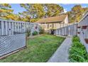 Private backyard featuring a neat lawn area and fenced perimeter, perfect for outdoor enjoyment at 4006 Fairway Lakes Dr. # 4006, Myrtle Beach, SC 29577