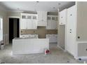 Unfinished kitchen featuring bright white cabinetry, offering a clean and modern aesthetic at 4268 Long Avenue Ext., Conway, SC 29526