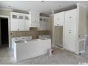 Unfinished kitchen featuring bright white cabinetry, offering a clean and modern aesthetic at 4268 Long Avenue Ext., Conway, SC 29526