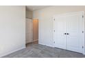 Neutral bedroom with spacious closets and a full-sized doorway at 549 Honeyhill Loop, Conway, SC 29526