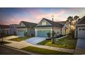 Exterior shot of a well-maintained home showcasing its tidy landscaping and classic design at 6562 Torino Lane, Myrtle Beach, SC 29572