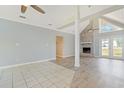 Spacious living room with vaulted ceilings and a charming fireplace, ready for personalization at 584 Circle Dr., Surfside Beach, SC 29575