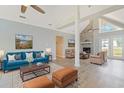 Bright living room features vaulted ceilings, stone fireplace, and stylish furnishings at 584 Circle Dr., Surfside Beach, SC 29575
