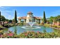 Beautiful fountain in community pond with gazebo and lush landscaping at 1004 Gold Dew Way, Myrtle Beach, SC 29579