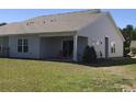 This home features a well-maintained lawn and covered patio, perfect for outdoor enjoyment at 1835 Berkley Village Loop, Myrtle Beach, SC 29579