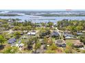 Panoramic aerial view showcasing the waterway, beach, and neighborhood homes at 218 Azalea Circle, Sunset Beach, NC 28468