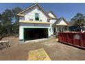 A new home under construction features a two-car garage at 2611 Painted Trillium Ct., Myrtle Beach, SC 29579
