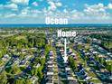 Aerial view of home in a coastal community, close to the ocean at 147 Marsh Deer Place, Surfside Beach, SC 29575