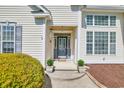 Inviting front entrance with decorative door, sidelights, and manicured shrubbery at 3300 Prioloe Dr., Myrtle Beach, SC 29588