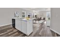 Eat-in kitchen featuring a marble island and countertop with a view of the living room at 500 Dundalk Dr., Conway, SC 29526