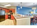 Well-equipped kitchen featuring modern appliances and granite countertops at 5300 N Ocean Blvd. # 922, Myrtle Beach, SC 29572