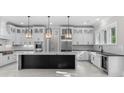 Spacious, eat-in kitchen featuring a center island, stainless steel appliances, and custom cabinetry at 100 Serenity Point Dr., Little River, SC 29566