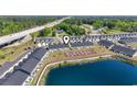 Aerial view showcasing proximity to the highway and the scenic lake at 295 Brackish Dr. # 673, Myrtle Beach, SC 29588