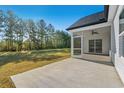 Expansive backyard featuring a covered patio, perfect for outdoor entertaining and relaxation at 4016 Macks Rd, Aynor, SC 29511