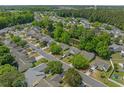 An aerial view showcases the property's setting in a serene residential neighborhood near the waterway at 622 Oakhurst Dr., Myrtle Beach, SC 29579