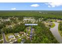 A high angle view showcases a tranquil neighborhood with picturesque landscaping, near serene lakes and ponds at 8008 Mcsweeney Ct., Myrtle Beach, SC 29588