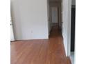 Clean hallway with hardwood floors, providing access to various rooms within the home at 1465 Dirty Branch Rd., Conway, SC 29527