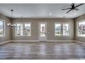 Spacious living room filled with natural light, complemented by sleek flooring and modern fixtures at 468 Saint Julian Ln., Myrtle Beach, SC 29579