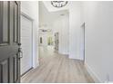 Bright foyer features soaring ceilings, neutral paint, and expansive floors at 4932 South Island Dr., North Myrtle Beach, SC 29582