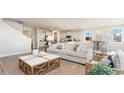 Comfortable living room, seamlessly connected to the kitchen, with a stylish coffee table and plush seating at 745 Choctaw Dr., Conway, SC 29526