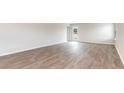 Bright open living area with hardwood floors and access to the outdoors at 843 Buttonwood Dr., Conway, SC 29527
