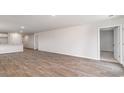 Expansive living room area with modern hardwood flooring and neutral color palette at 843 Buttonwood Dr., Conway, SC 29527