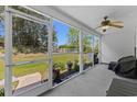 Relaxing screened porch overlooking private backyard with room for entertainment at 1004 Harvester Circle # 1004, Myrtle Beach, SC 29579