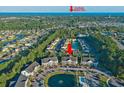 Aerial view of condo complex with nearby beach access and community amenities at 106 Birch N Coppice Dr. # 2, Surfside Beach, SC 29575