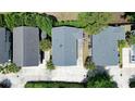 Aerial view of a neighborhood featuring green trees and landscaping at 1131 Camellia Dr., Surfside Beach, SC 29575