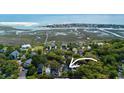 Breathtaking aerial view of a coastal community near pristine waterways and beaches at 119 Berry Tree Dr., Pawleys Island, SC 29585