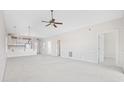 Open floor plan with a spacious living room and views of other rooms and vaulted ceilings at 1514 Lanterns Rest Rd. # 304, Myrtle Beach, SC 29579