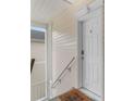 Inviting entryway with a secure front door, convenient ramp and neutral siding at 480 River Oaks Dr. # 63-O, Myrtle Beach, SC 29579